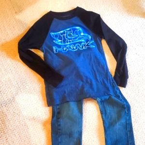 Tony Hawk long sleeve tee and jeans.